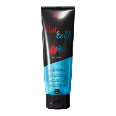 Frasco preto e azul metálico de gel íntimo com texto e ícones de chama e floco de neve