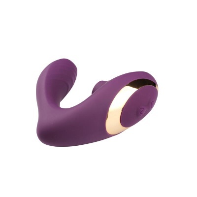 Vibrador roxo com detalhes dourados em fundo branco