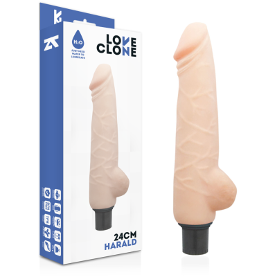 Vibrador realista cor pele claro com base preta ao lado da caixa com texto LOVE CLONE e 24CM HARALD