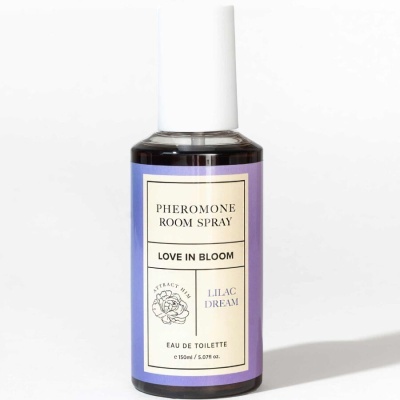 Frasco de spray para ambiente com rótulo lilás e tampa branca