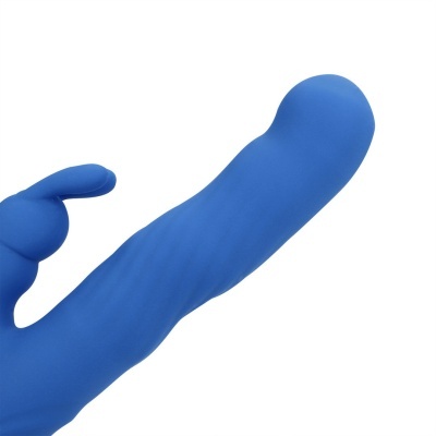 Vibrador azul em silicone com textura ondulada e protuberância adicional