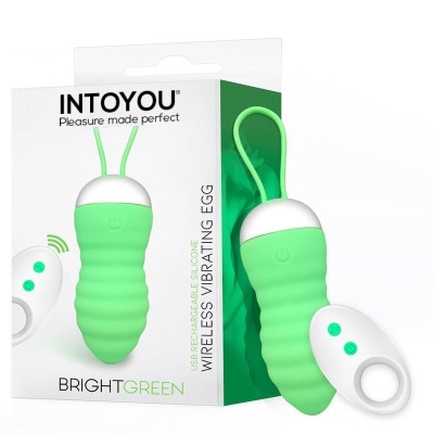Vibrador sem fios verde e branco com comando remoto na embalagem