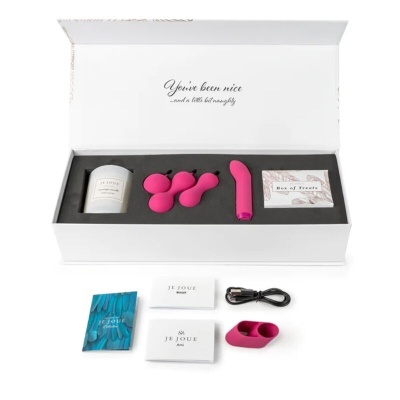 Conjunto de produtos JE JOUE em caixa aberta com acessórios cor de rosa e manuais.