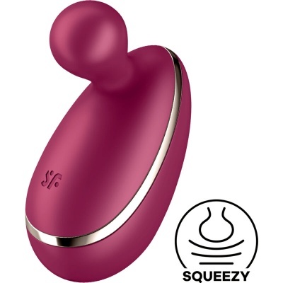 Dispositivo roxo oval com detalhe prateado e símbolo SQUEEZY