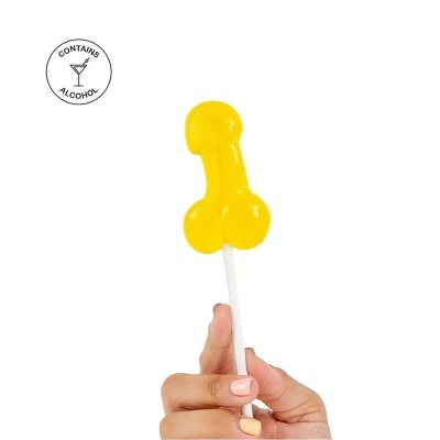 Pirulito amarelo em formato fálico com texto contém álcool