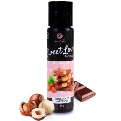 Frasco de gel com sabor chocolate e avelã ao lado de pedaços de chocolate e avelãs
