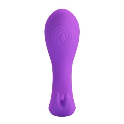 Objeto roxo alongado com textura circular e abertura em U na base