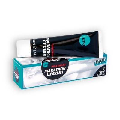 Creme em bisnaga preta sobre caixa azul clara com texto e imagem desfocada