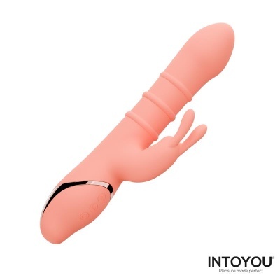 Vibrador rosa em silicone com dois estimuladores e detalhes prateados