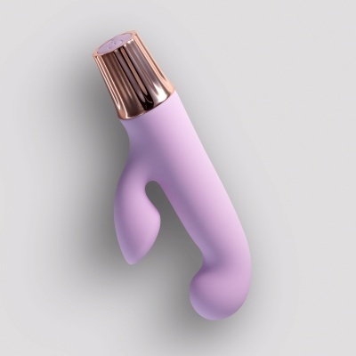 Produto lilás com tampa metálica dourada rosada
