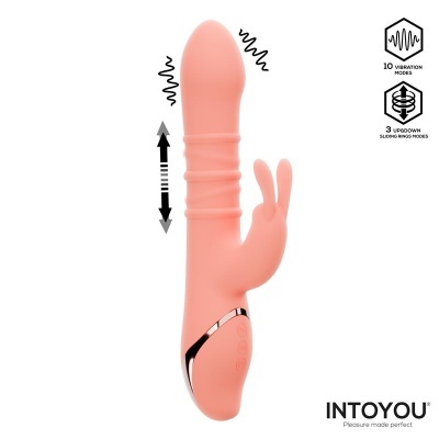 Vibrador rosa com botões na base e duas orelhas laterais em fundo branco
