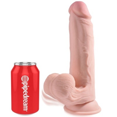 Dildo realista cor de pele com base de ventosa ao lado de lata vermelha pipedream