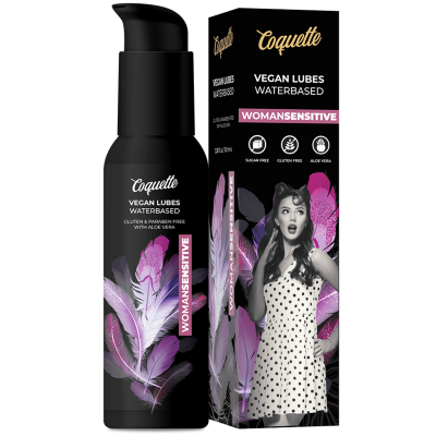 Produto Coquette Vegan Lubes à base de água com embalagem preta e penas cor-de-rosa e lilás