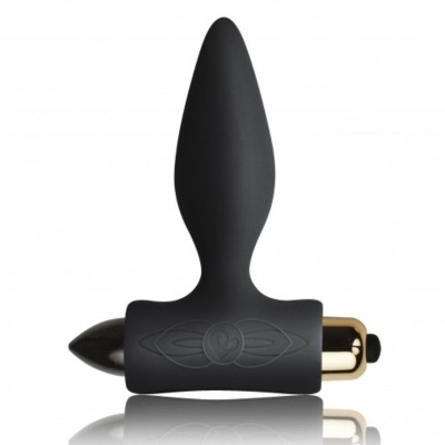 Plug anal preto com detalhes em relevo e peça dourada metálica