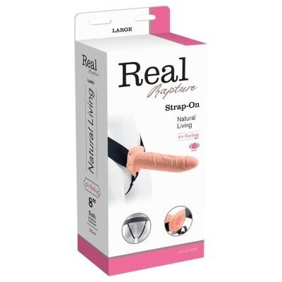 Embalagem de strap-on Real Rapture em embalagem branca e rosa com dildo cor flesh e cinta preta
