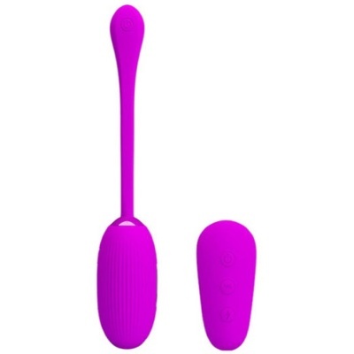 Vibrador de silicone roxo com controle remoto roxo em fundo branco