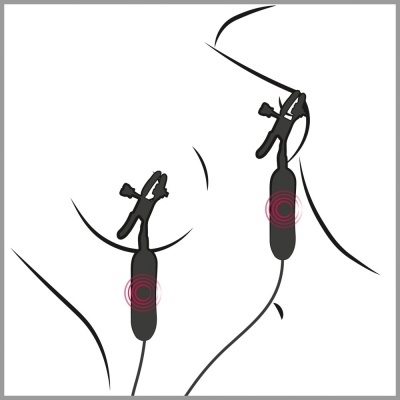 dois clips negros presos a pele com detalhes vermelhos circulares