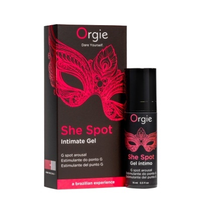 Gel íntimo Orgie She Spot com embalagem preta e rosa, máscara decorativa e texto promocional