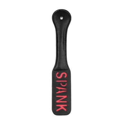 Pá preta com a palavra SPANK em vermelho