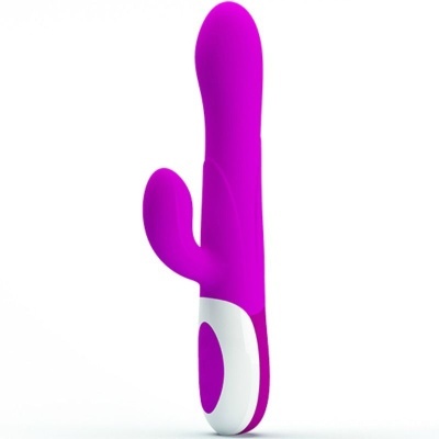 Vibrador cor-de-rosa em silicone com base branca e estimulador lateral