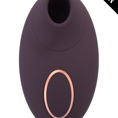 Produto eletrônico oval roxo escuro com botão dourado rosé e etiqueta TESTER
