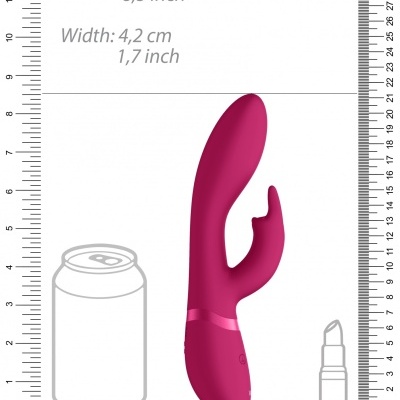 Vibrador cor-de-rosa em silicone com régua de medição em fundo branco