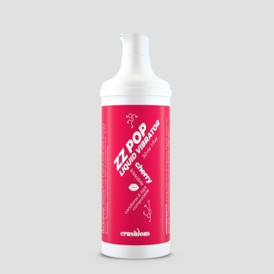 Frasco branco com tampa de bomba e rótulo vermelho com texto branco
