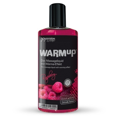 Frasco de líquido de massagem rosa com etiqueta preta e imagem de framboesas