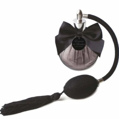 Frasco de perfume vintage cinzento com laço preto e atomizador preto
