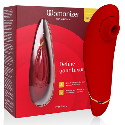 Produto Womanizer The Original Premium 2 vermelho com embalagem vermelha e bordô
