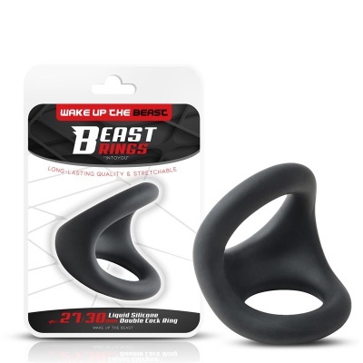 Anel duplo preto de silicone líquido na embalagem Beast Rings.