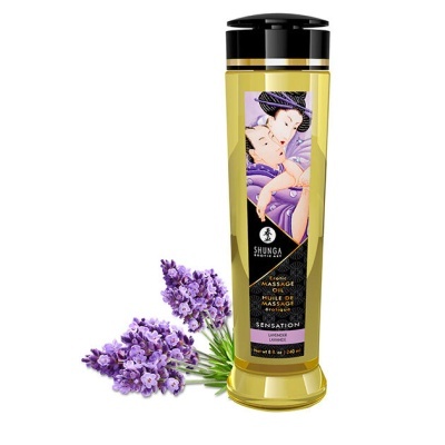 Frasco de óleo de massagem erótico SHUNGA com rótulo ilustrado e flores de lavanda.