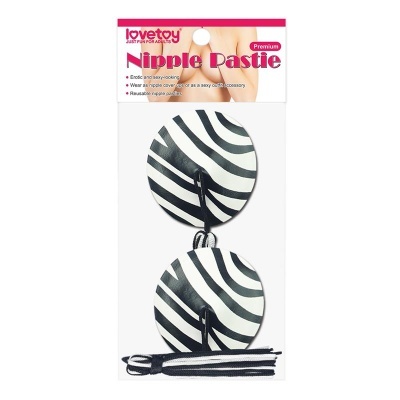 Pasties para mamilos com padrão zebra preto e branco numa embalagem branca com topo rosa