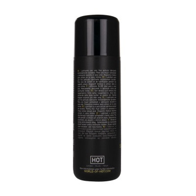 Frasco preto de lubrificante anal com rótulo multilíngue e texto da marca HOT
