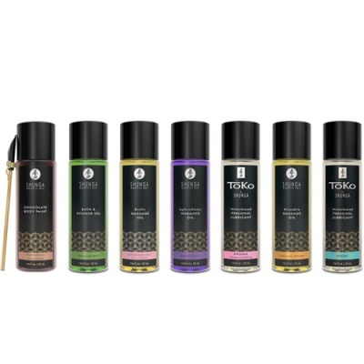 Sete frascos de produtos pessoais SHUNGA e TOKO com rótulos coloridos e tampas pretas