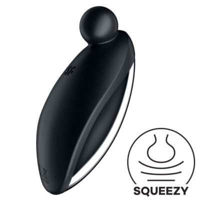 Dispositivo preto ergonómico com bola no topo e texto SQUEEZY