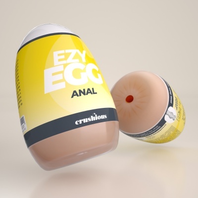 Embalagem de produto amarelo com texto EZY EGG ANAL e parte interior rosada visível