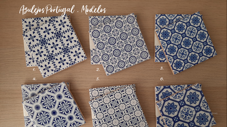 Six blue and white patterned ceramic tiles on wood labeled Azulejos Portugal Modelos