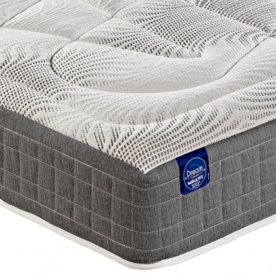 Colchão com superfície branca acolchoada e laterais cinza com etiqueta azul