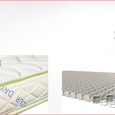 Colchão branco acolchoado com borda verde e estrutura interna de molas metálicas da marca BESTBED