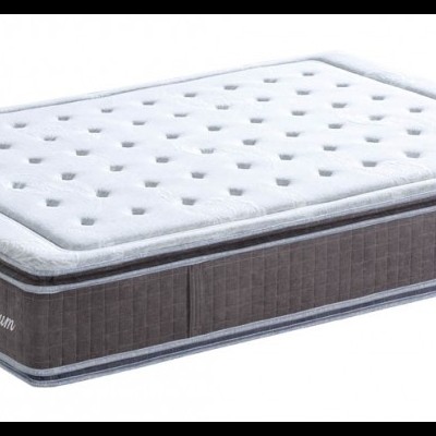 Colchão rectangular branco e cinza com padrão e etiqueta 'Premium'