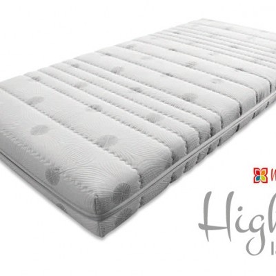 Colchão branco com padrão acolchoado e texto Mindol GRUPO High látex