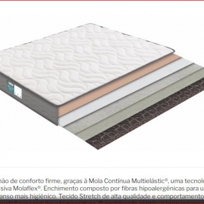 Colchão com várias camadas visíveis e etiqueta na lateral