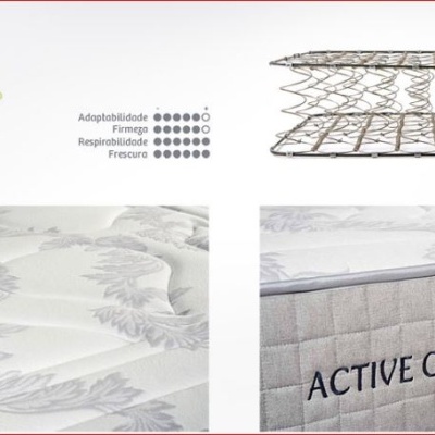 Colchão branco com padrão floral e etiqueta ACTIVE GRAFEN BOX BY BESTBED