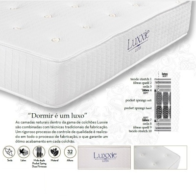 colchão Luxxie branco com textura acolchoada e etiqueta