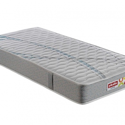 Colchão retangular cinzento com textura ondulada e alças laterais