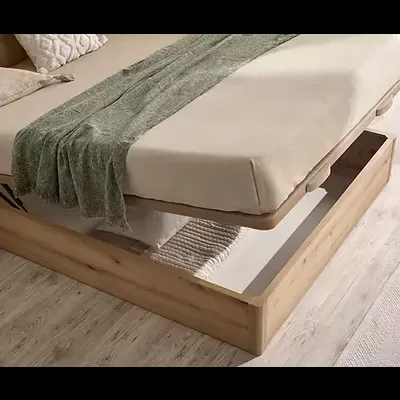 Cama de solteiro de madeira clara com colchão bege e manta verde