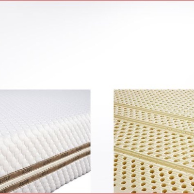 Colchão branco com estofado texturizado e camada de espuma perfurada