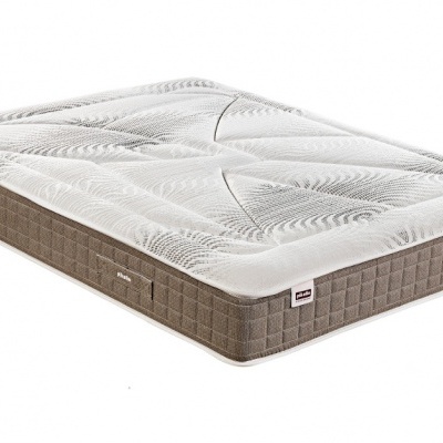 Colchão branco com laterais cinza e padrão acolchoado