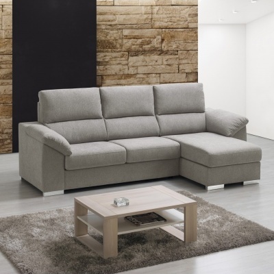 Sofá cinzento de tecido com chaise longue numa sala moderna